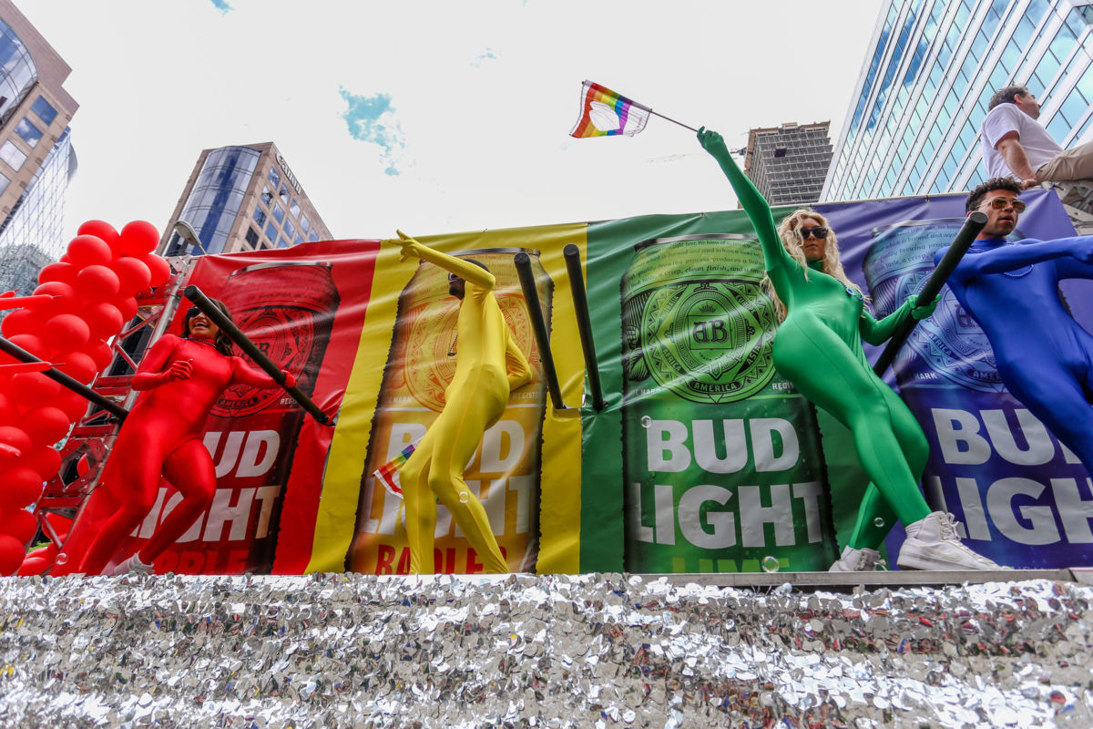 Budweiser employees dance on a float during the Toronto Pride Parade, June 25, 2017.