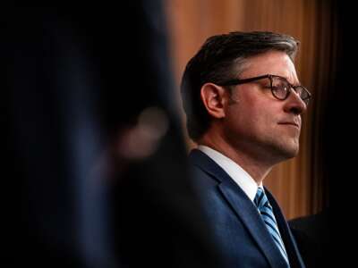 Speaker of the House Mike Johnson (R-Louisiana) listens during a news conference at the U.S. Capitol on May 15, 2024.