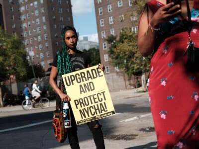 Residents and activists gather outside of the Jacob Riis Houses for a protest against the living conditions at the public housing unit on September 14, 2022, in New York City.