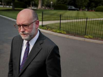 Office of Management and Budget Director Russell Vought talks to reporters outside the West Wing of the White House on June 3, 2025, in Washington, D.C.